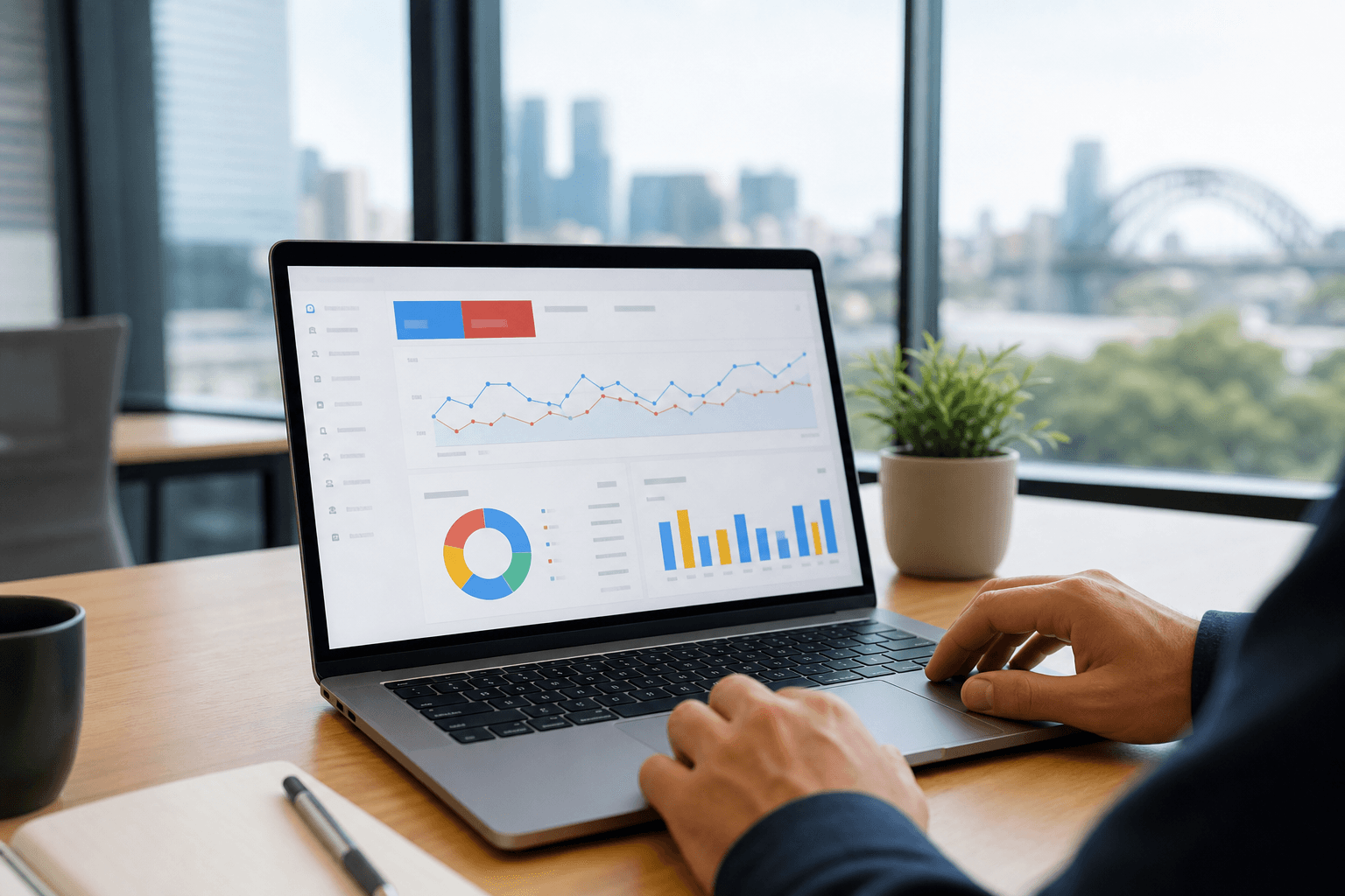 Laptop displaying search advertising analytics charts on a modern desk