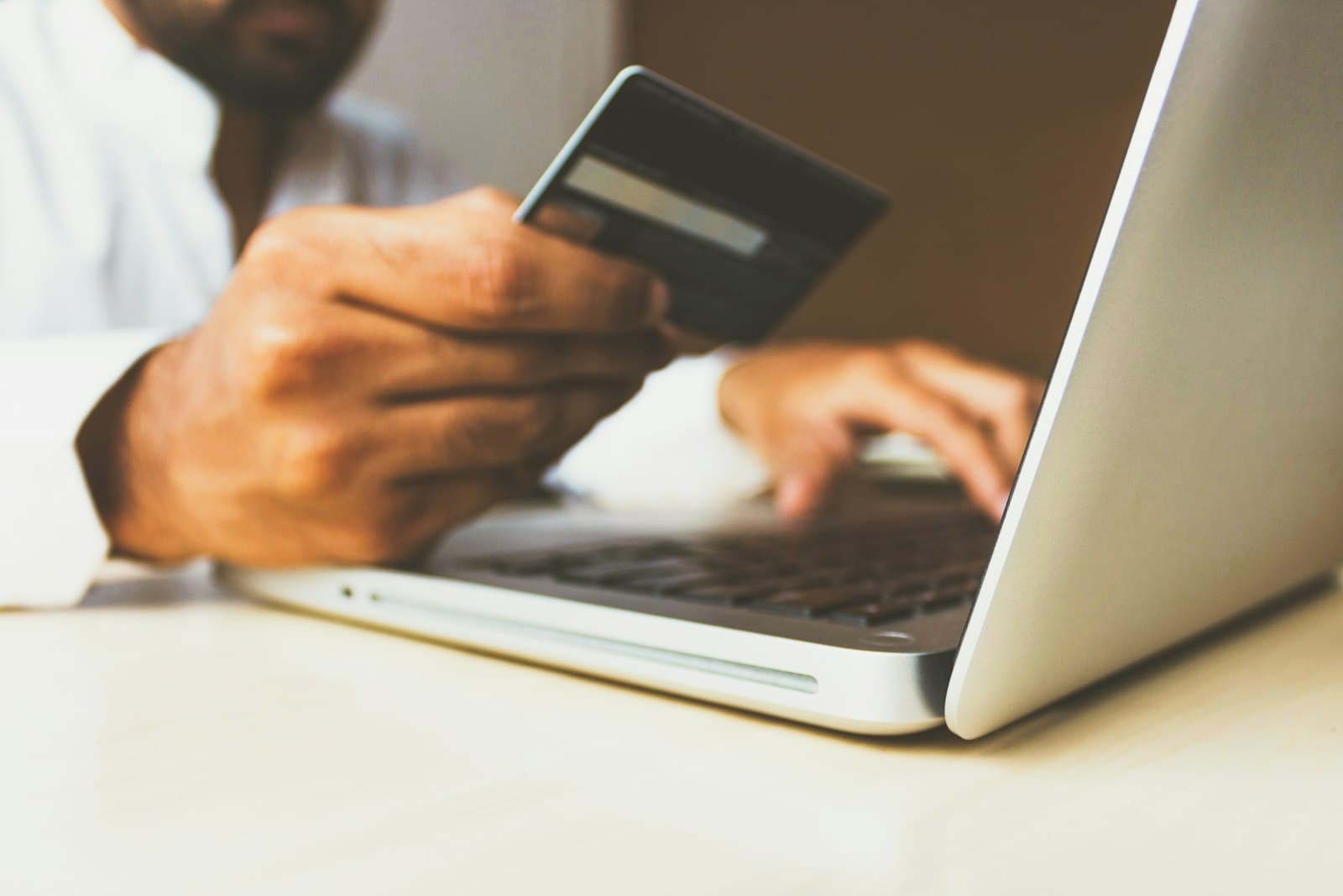 Person browsing products on a smartphone during an online purchase